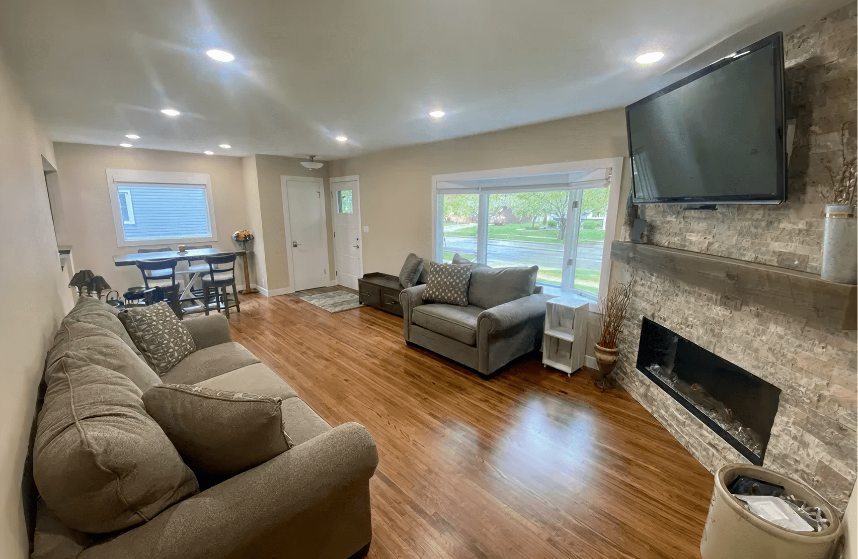 Spacious living area with hardwood floors