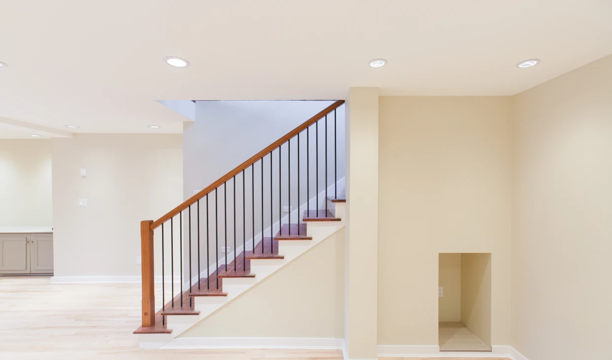 Bright hallway featuring staircase design